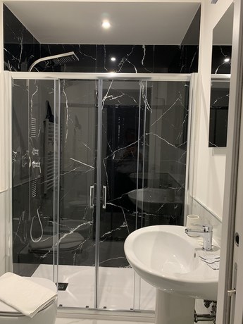 Imagen de la habitación del Lungotevere Collection Suite. Foto 11