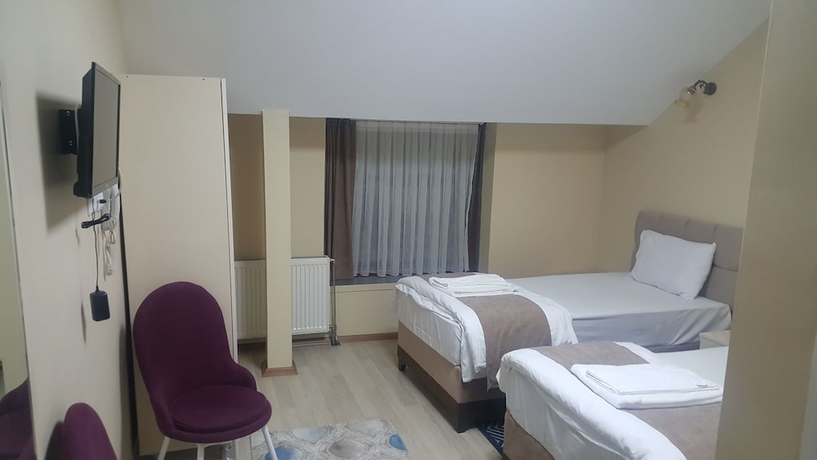 Imagen de la habitación del Lux Otel. Foto 7