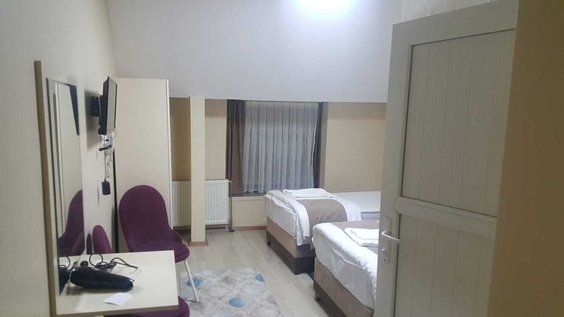 Imagen de la habitación del Lux Otel. Foto 11