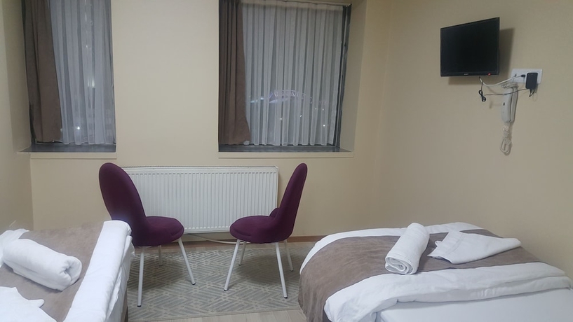 Imagen de la habitación del Lux Otel. Foto 14