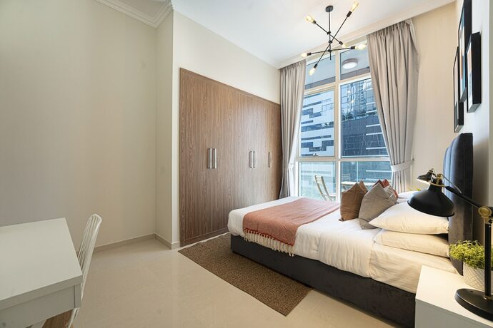Imagen de la habitación del Luxe Apartments near Dubai Mall, Burj Khalifa - Pool, Gym, and Parking by Sojo Stay. Foto 18