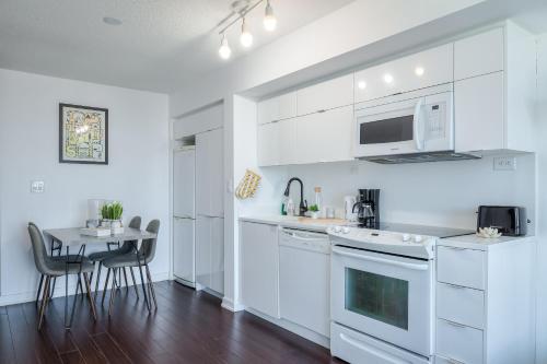 Imagen de la habitación del Luxury Apartments in Mississauga and Toronto - Free Parking & Large Balcony. Foto 18