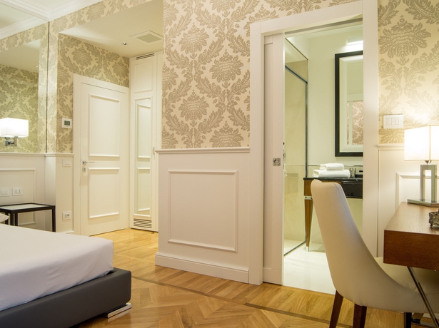 Imagen de la habitación del Luxury Duomo Rooms. Foto 5