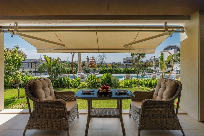 Imagen de la habitación del Luxury Garden Suites. Foto 11