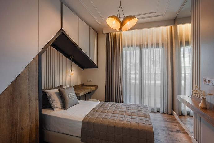 Imagen de la habitación del Luxury Garden Suites. Foto 12