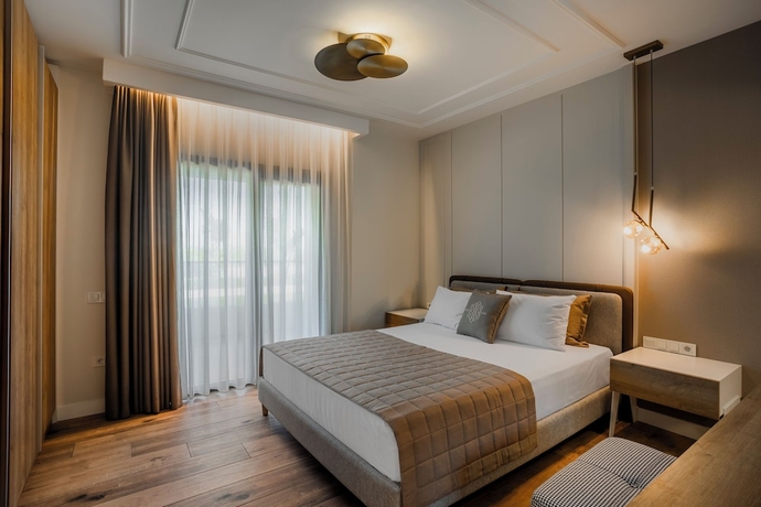 Imagen de la habitación del Luxury Garden Suites. Foto 13