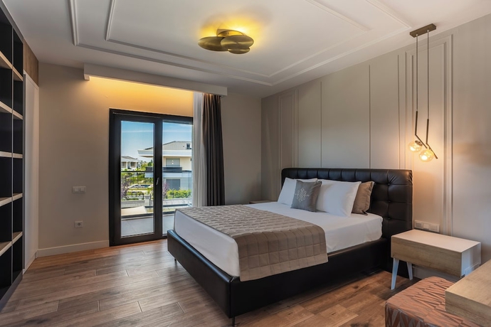 Imagen de la habitación del Luxury Garden Suites. Foto 16