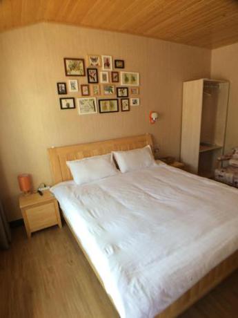 Imagen general del Lvshui Qingshan Inn. Foto 3