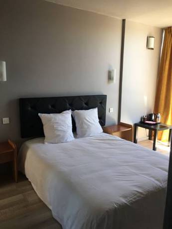 Imagen de la habitación del M Hotel. Foto 15