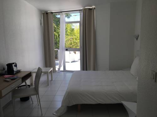 Imagen de la habitación del M Hotel, Gignac. Foto 4