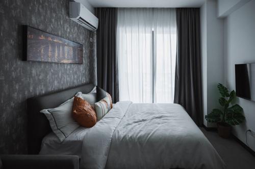 Imagen de la habitación del M Residence Hotel and Serviced Apartment. Foto 19