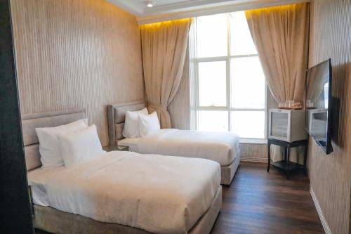 Imagen de la habitación del M14 Hotel Apartment. Foto 19