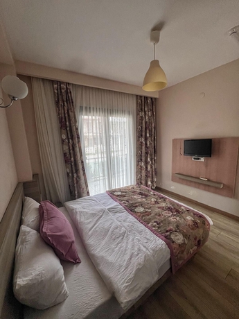 Imagen de la habitación del MARİNA SUİTE OTEL. Foto 10