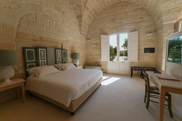 Imagen de la habitación del MASSERIA LILEI. Foto 20