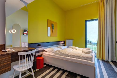 Imagen de la habitación del MEININGER Hotel Bruxelles Gare du Midi. Foto 13