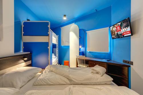 Imagen de la habitación del MEININGER Hotel Bruxelles Gare du Midi. Foto 16