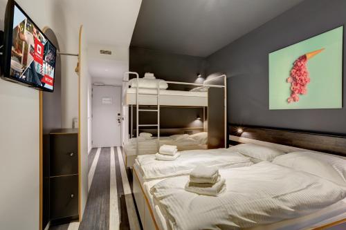 Imagen de la habitación del MEININGER Hotel Bruxelles Gare du Midi. Foto 18