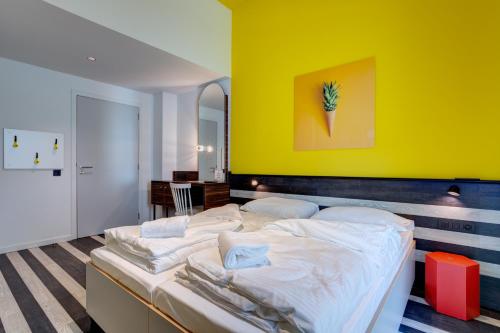 Imagen de la habitación del MEININGER Hotel Bruxelles Gare du Midi. Foto 19