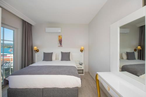 Imagen de la habitación del MIA CASA HOTEL. Foto 19
