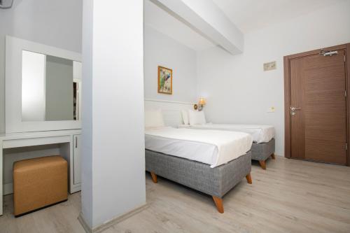 Imagen de la habitación del MIA CASA HOTEL. Foto 20