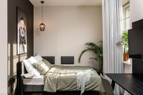 Imagen de la habitación del MILESTONE Krakow Center Urban Living. Foto 19