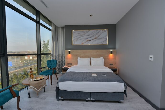 Imagen de la habitación del MILLS HOTEL. Foto 16