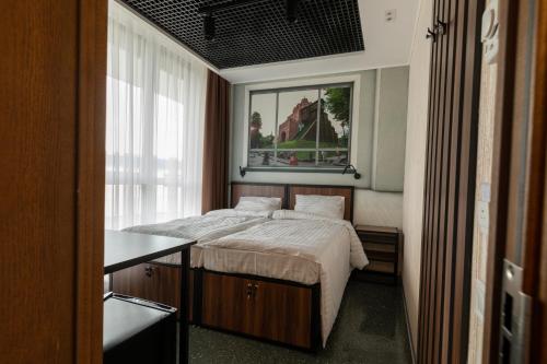 Imagen de la habitación del MISTO capsule hotel. Foto 20