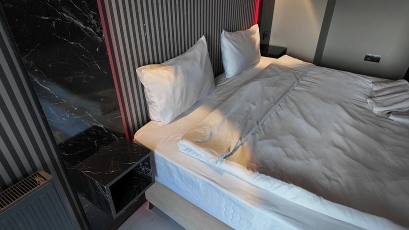 Imagen de la habitación del MİMOZA REZİDANS. Foto 1