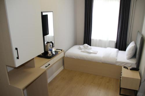 Imagen de la habitación del MOF Hotel Edirne. Foto 18