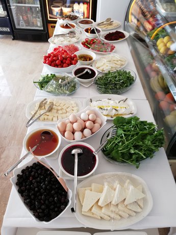 Imagen del bar/restaurante del MORDOĞAN Zeytinli Konak Butik Hotel. Foto 3