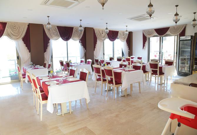 Imagen del bar/restaurante del MORDOĞAN Zeytinli Konak Butik Hotel. Foto 5