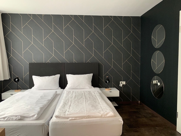 Imagen de la habitación del MOTELO Bielefeld. Foto 4