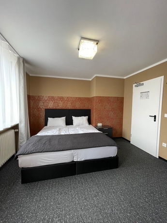 Imagen de la habitación del MOTELO Bielefeld. Foto 5