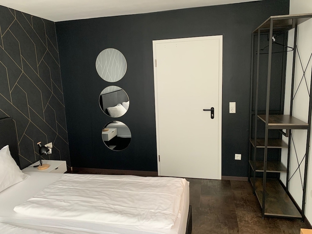 Imagen de la habitación del MOTELO Bielefeld. Foto 6
