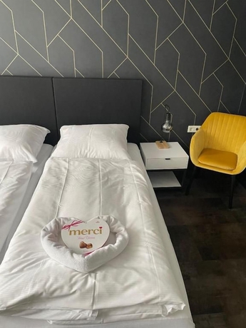 Imagen de la habitación del MOTELO Bielefeld. Foto 8