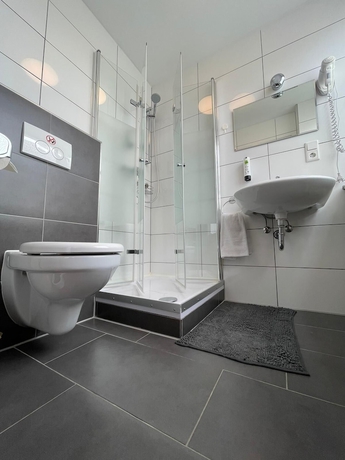 Imagen de la habitación del MOTELO Bielefeld. Foto 10