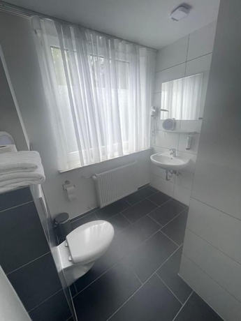 Imagen de la habitación del MOTELO Bielefeld. Foto 12