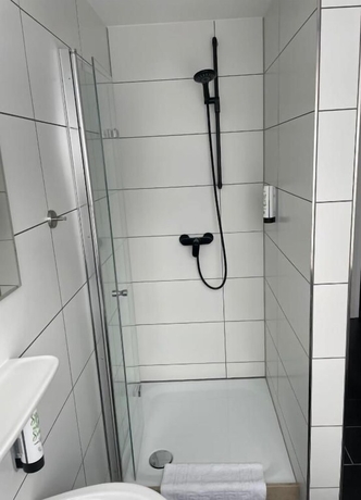 Imagen de la habitación del MOTELO Bielefeld. Foto 14
