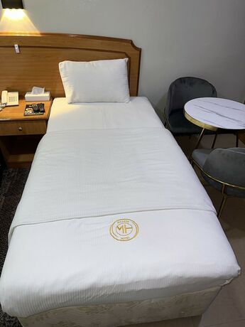 Imagen de la habitación del Maaeen Hotel. Foto 13