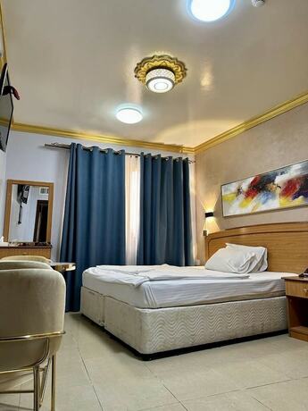 Imagen de la habitación del Maaeen Hotel. Foto 14