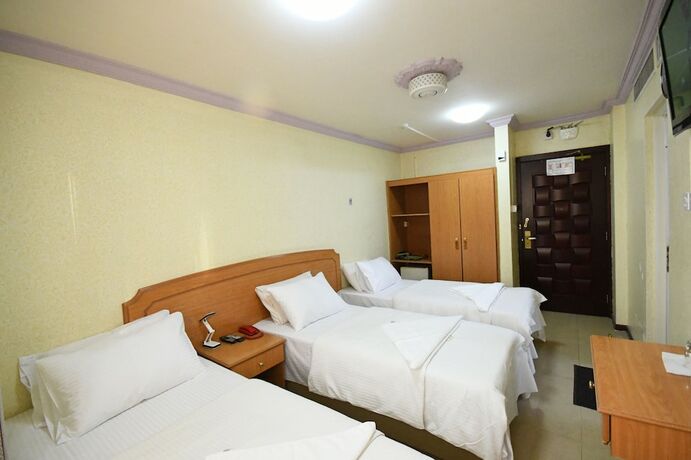 Imagen de la habitación del Maaeen Hotel. Foto 15