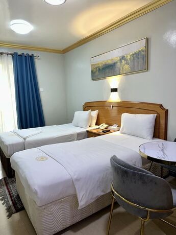 Imagen de la habitación del Maaeen Hotel. Foto 19