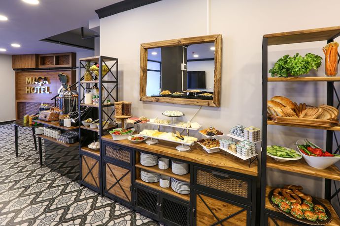 Imagen del bar/restaurante del Maca Otel. Foto 4