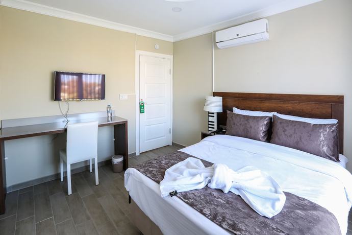 Imagen de la habitación del Maca Otel. Foto 14