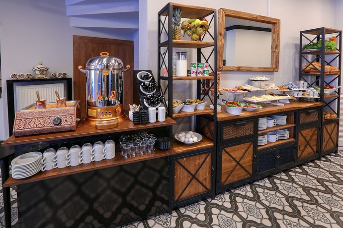 Imagen del bar/restaurante del Maca Otel. Foto 7