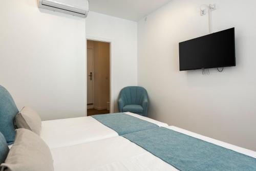 Imagen de la habitación del Madalena Hostel e Suites. Foto 17
