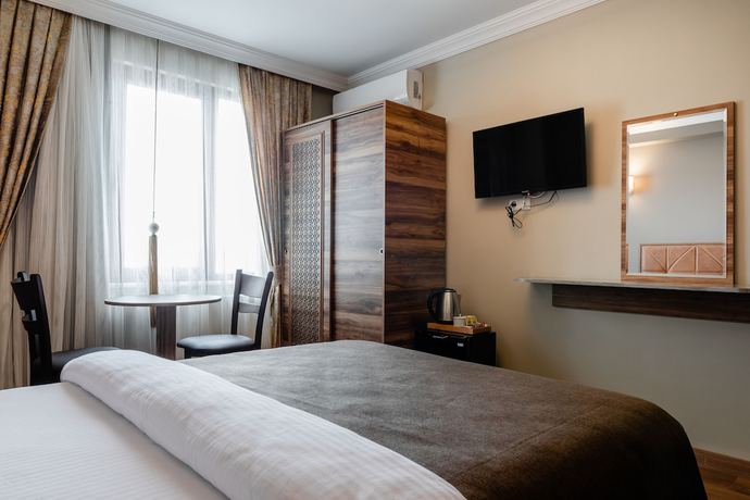 Imagen de la habitación del Madame Roza Hotel. Foto 12