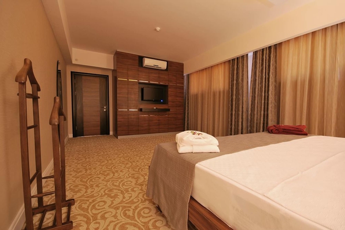 Imagen de la habitación del Madame Tadia Hotel. Foto 10