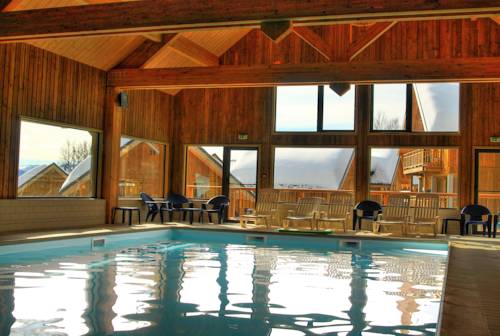 Imagen de la piscina del Madame Vacances Residence Les Chalets Du Berger. Foto 19