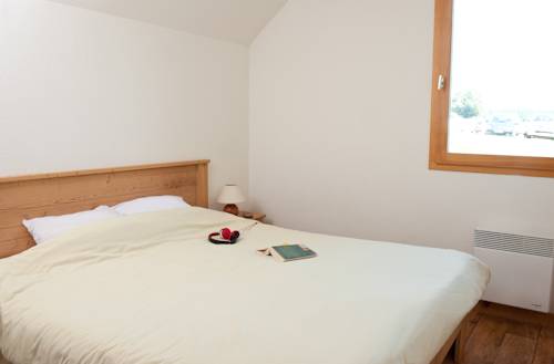 Imagen de la habitación del Madame Vacances Residence Les Chalets Du Berger. Foto 11